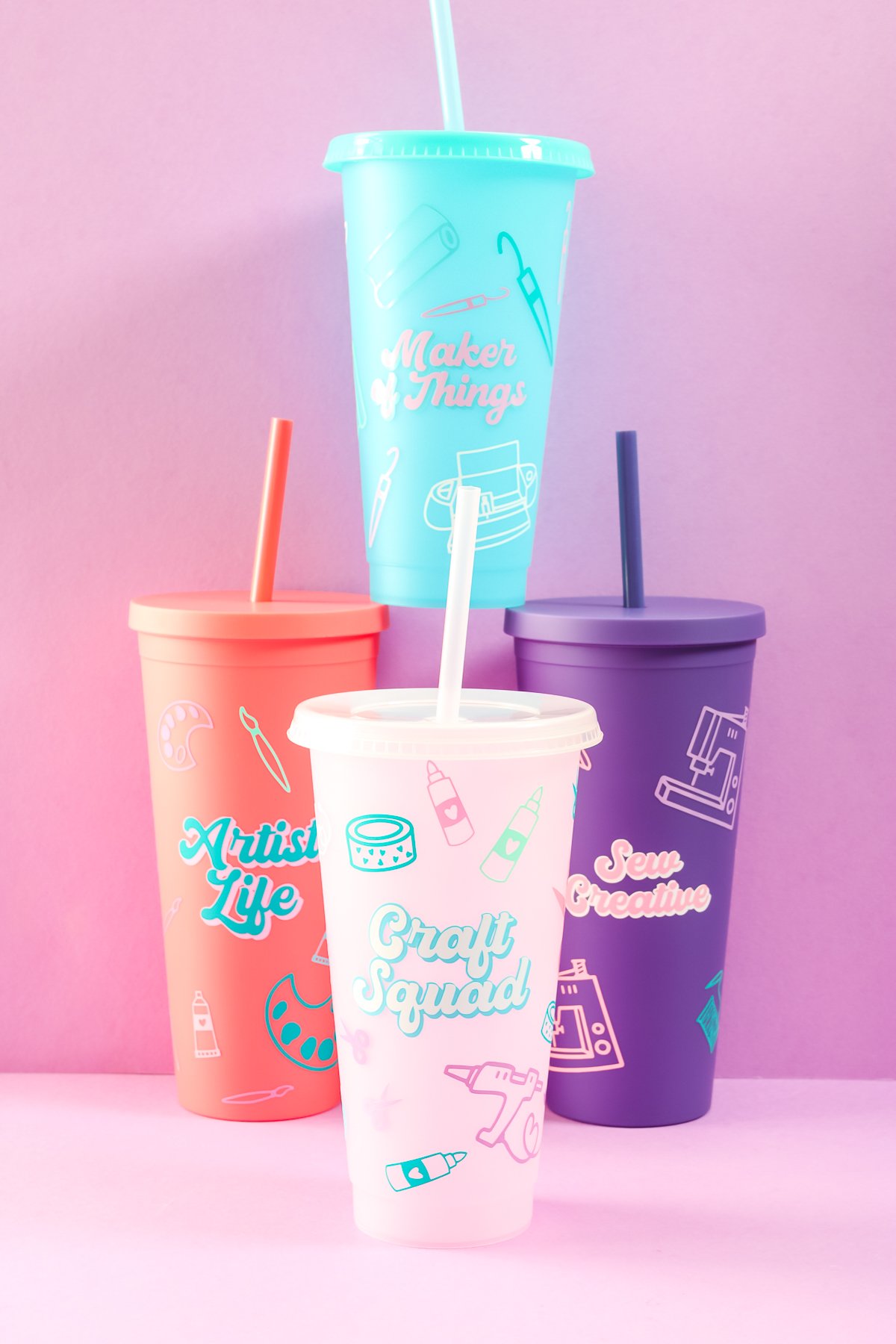 Vertical image of tumblers customized with vinyl scraps.