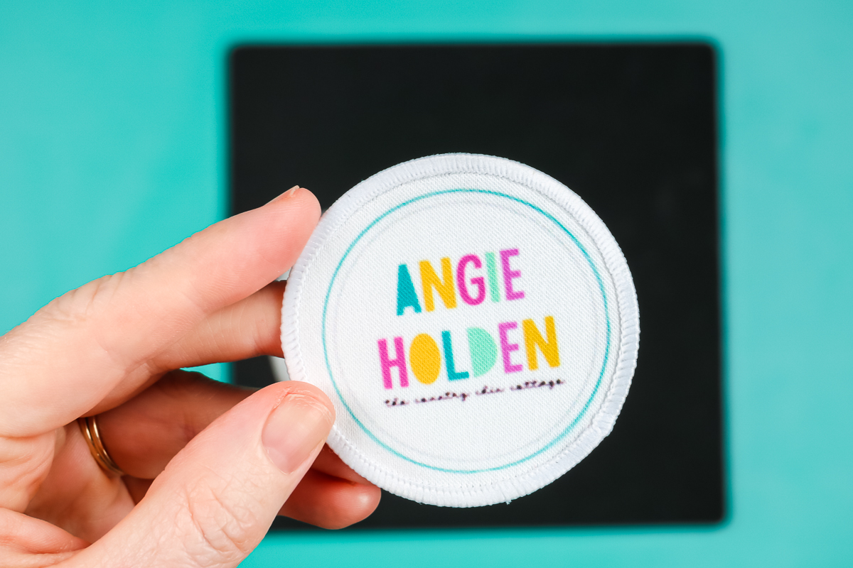 Finished sublimation patch with Angie Holden logo.