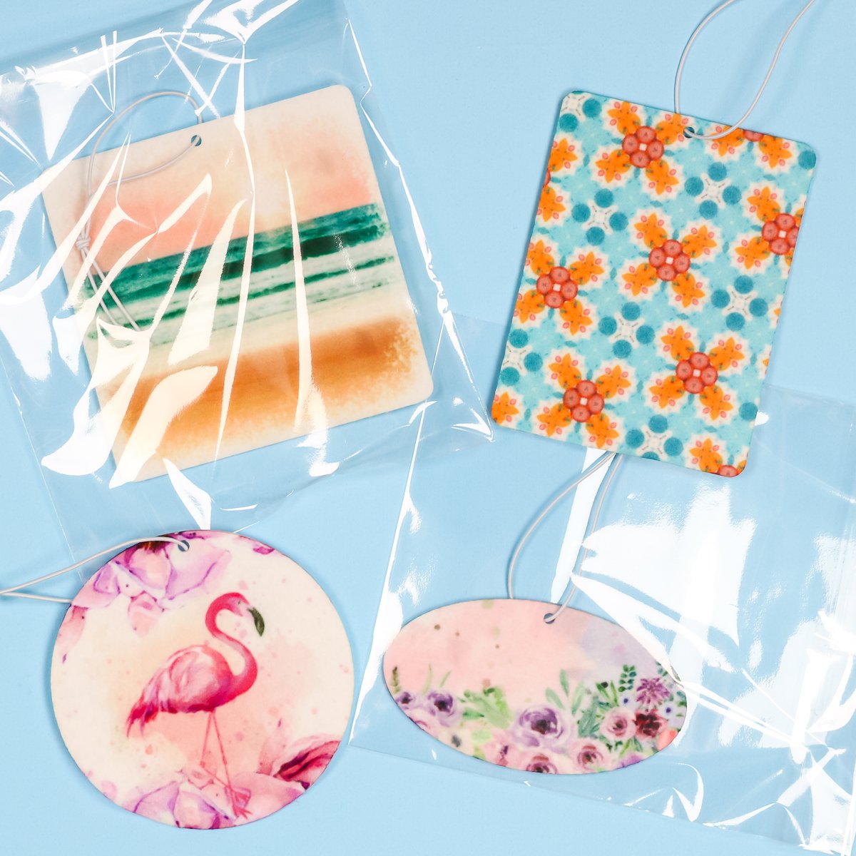 Complete and packaged sublimation air fresheners.