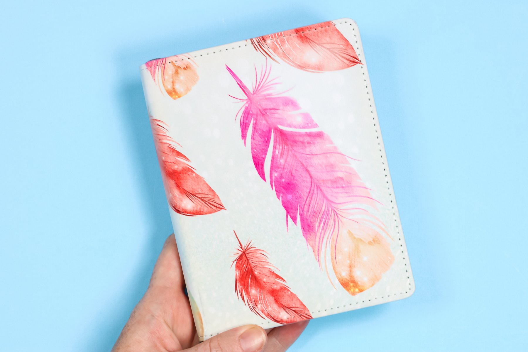 Finished sublimation notebook with feather print on front and back.