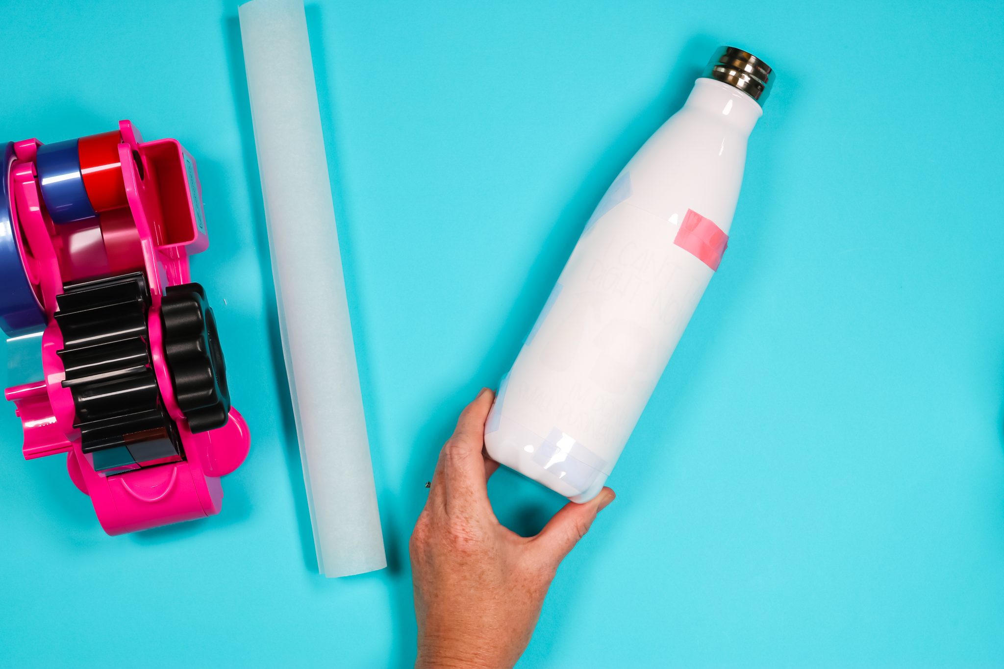 Tapered water bottle with sublimation molding applied.