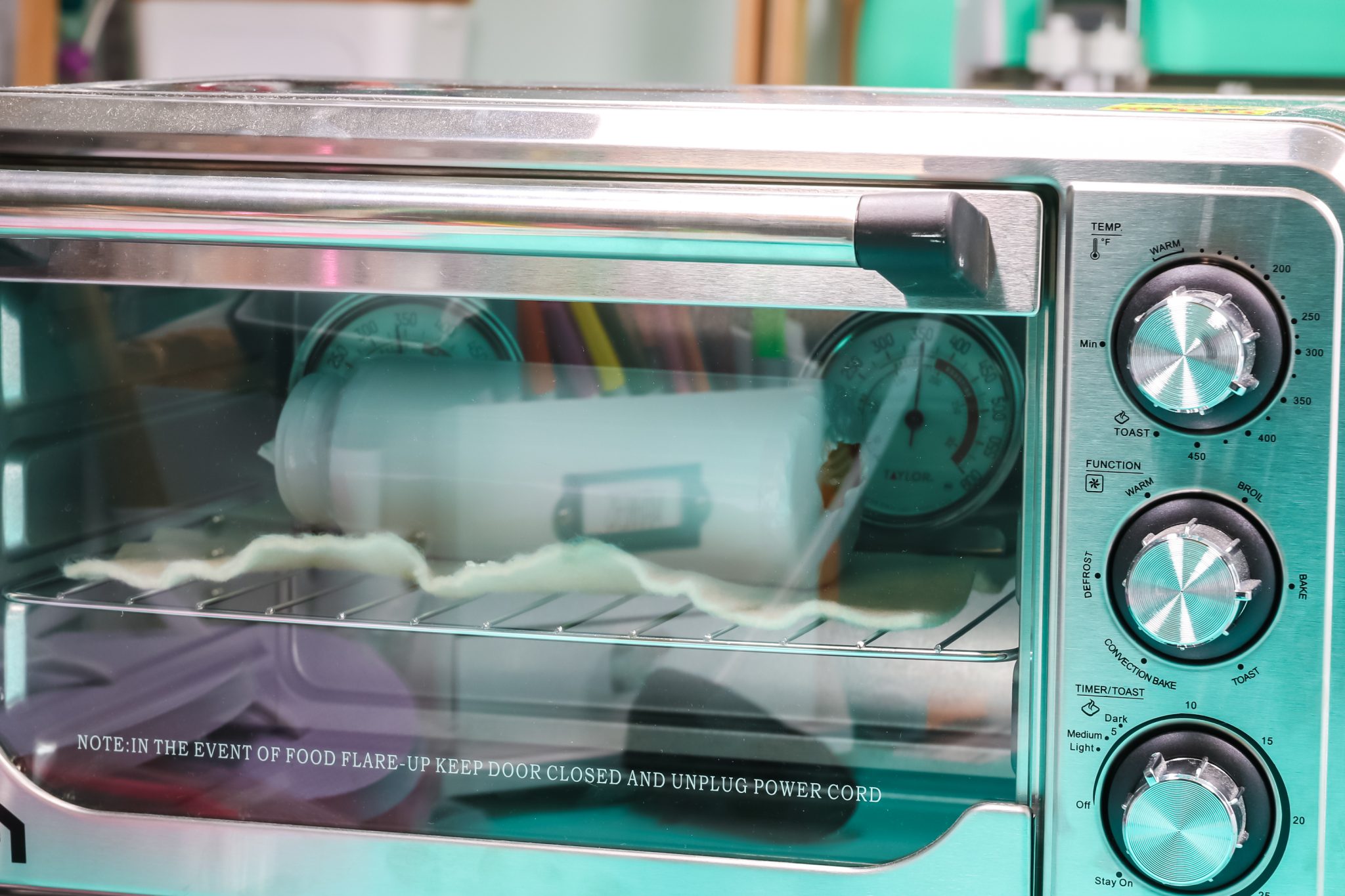 Convection oven with sublimation water bottle inside.