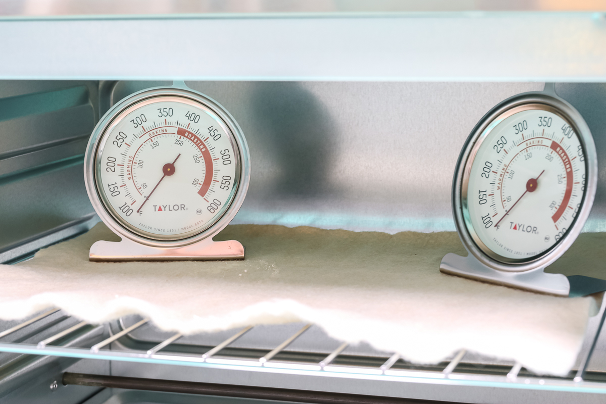 Oven thermometers inside convection oven.