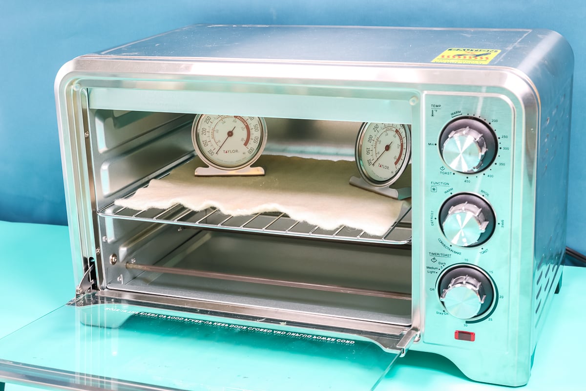 Convection oven with thermometers inside.