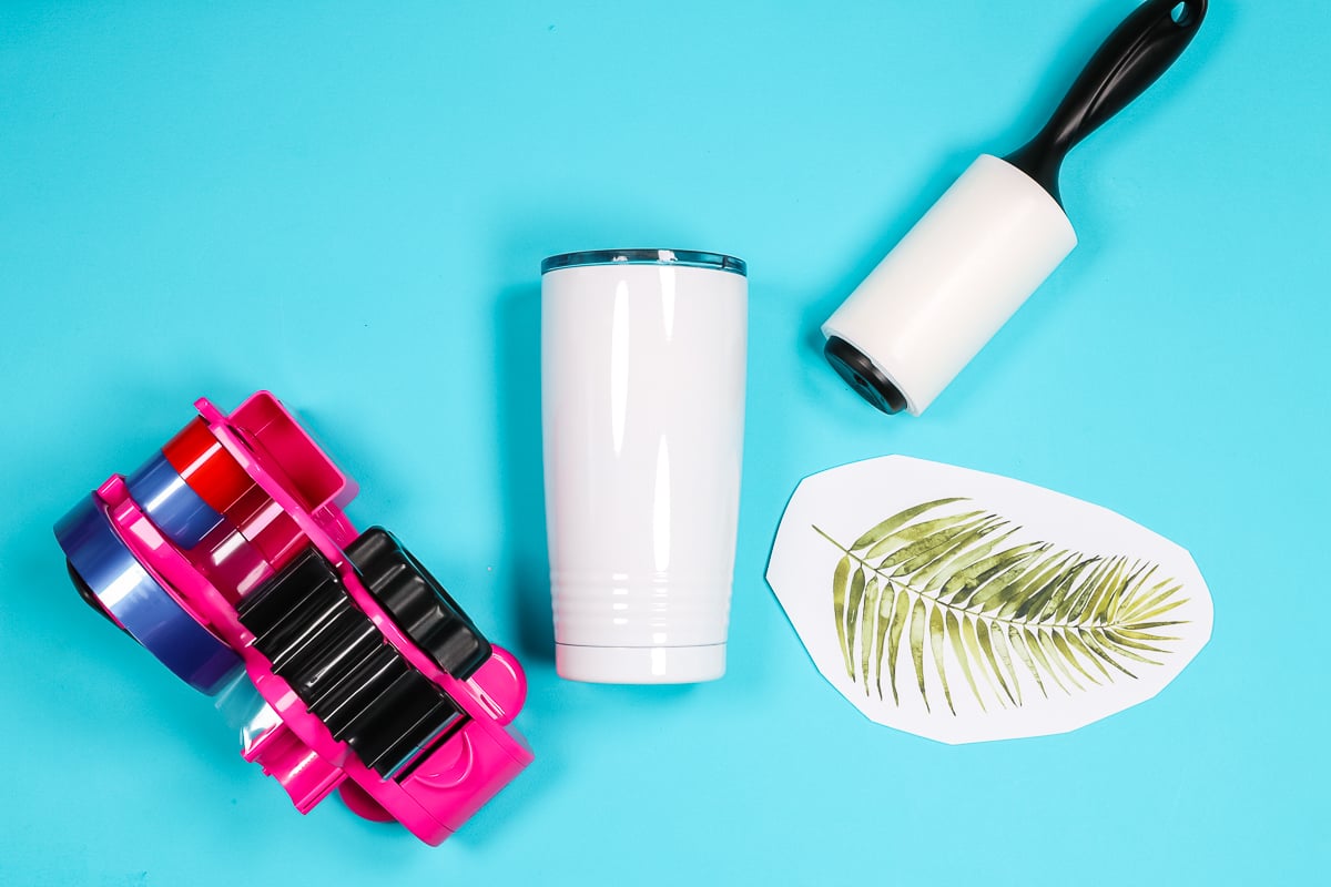 Lint roller, sublimation tumbler, heat tape and sublimation print.