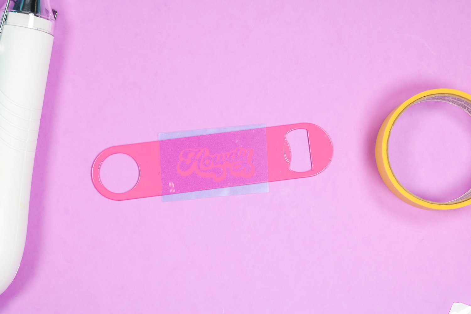 Apply stencil to pink bottle opener.