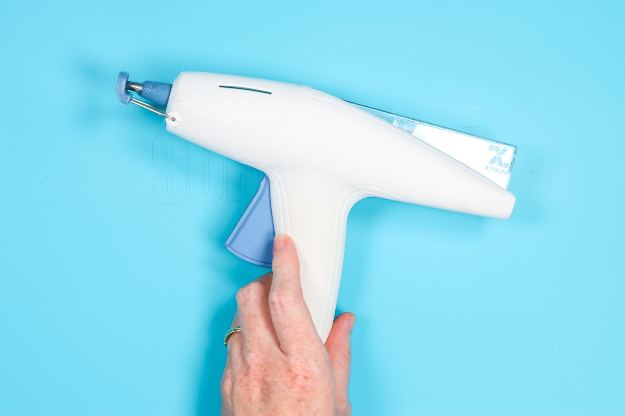 Xyron Multi-stick glue gun.