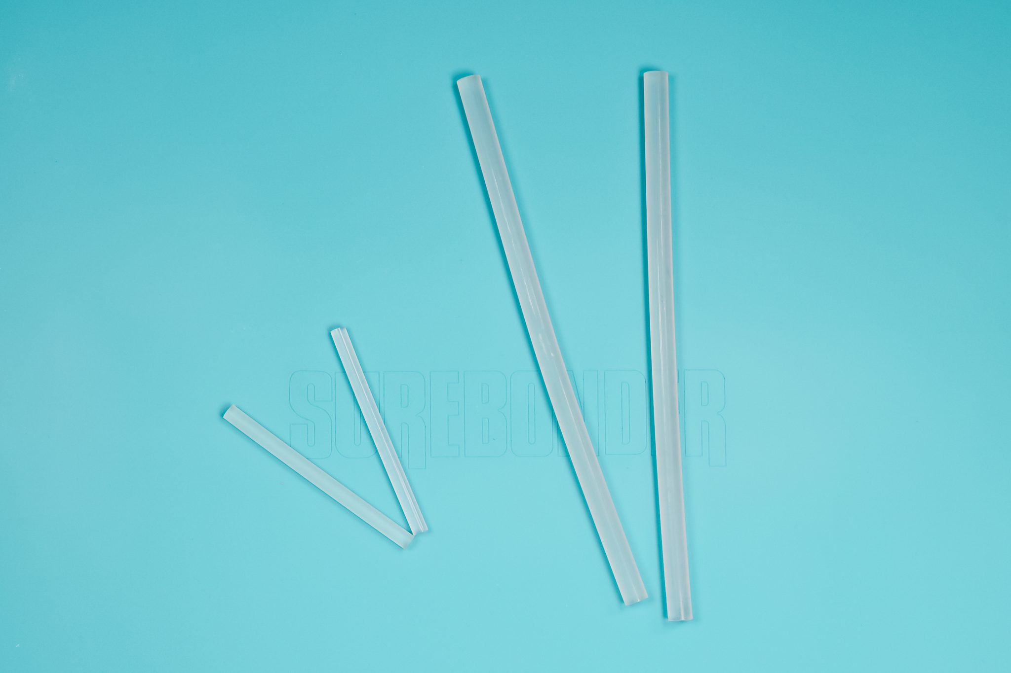 Silicone mat with large and mini glue sticks.