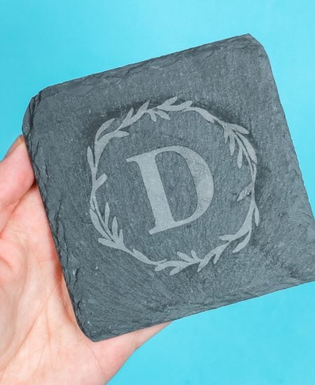 Etched slate with monogram design applied.