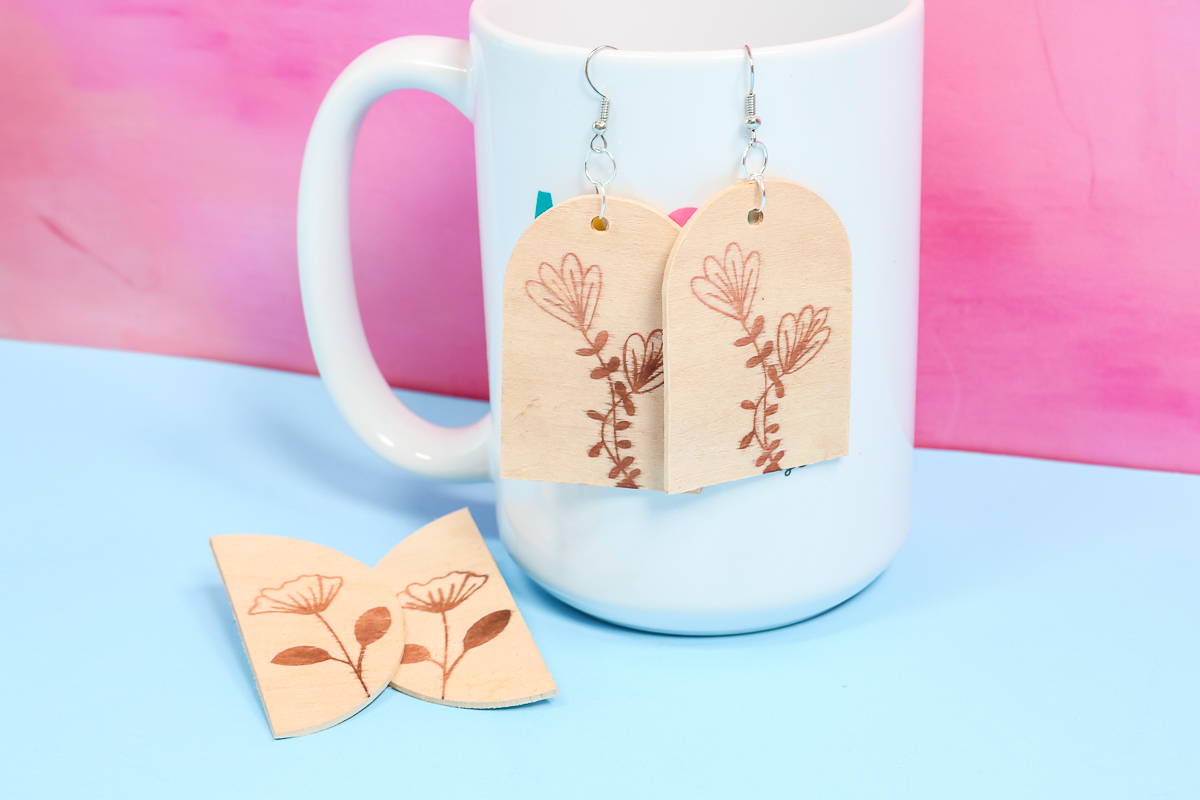 Cricut wood burned earrings finished.