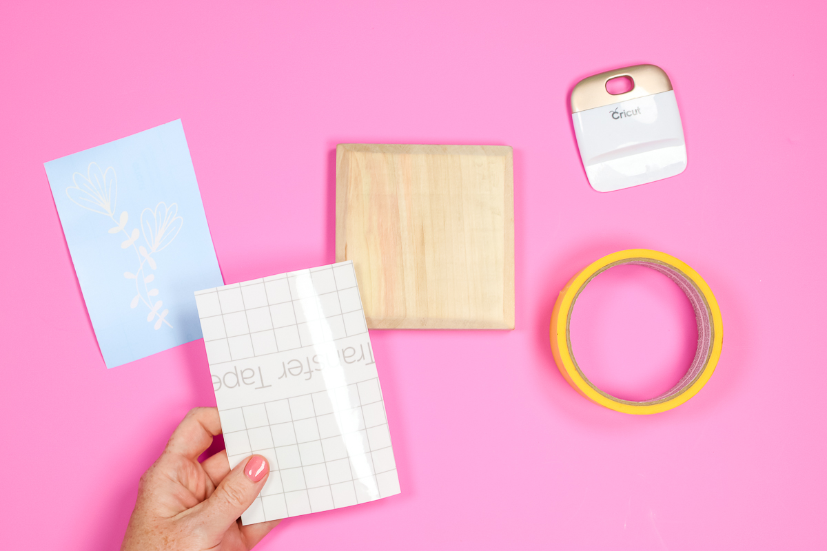 Use Transfer Tape to apply stencil vinyl to wood blank.