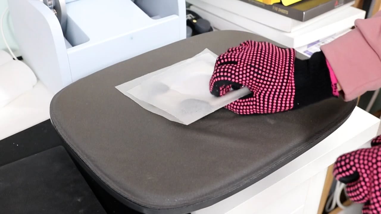 Pressing sublimation koozie in AutoPress.