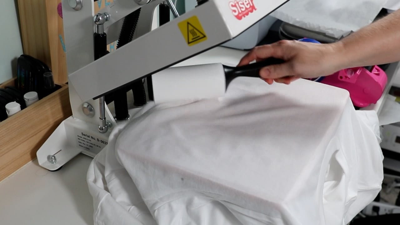 lint roll shirt in heat press