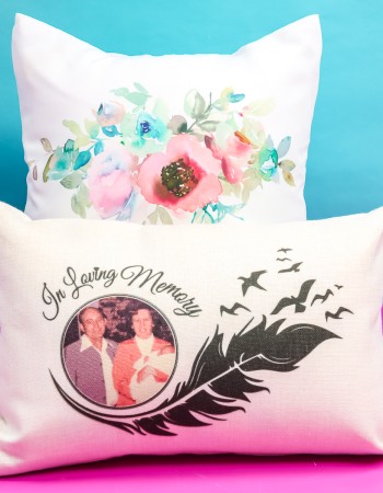 White square pillow and linen rectangle pillow with sublimation designs.