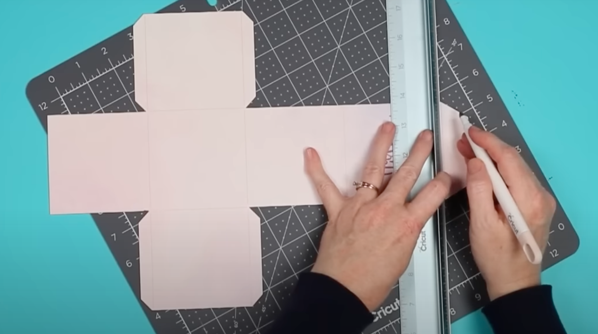 Use scoring tool to make score lines on Print Then Cut box.