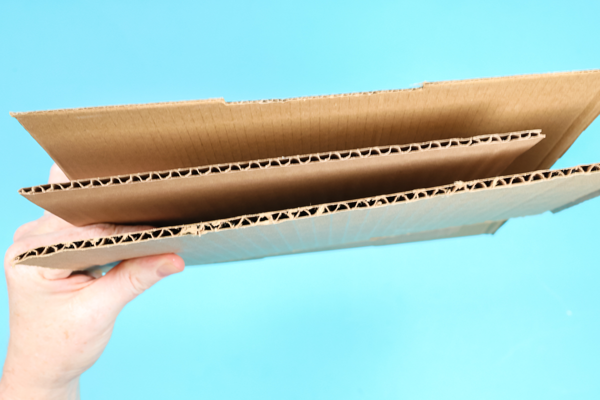 Three thickness of single wall corrugated cardboard.