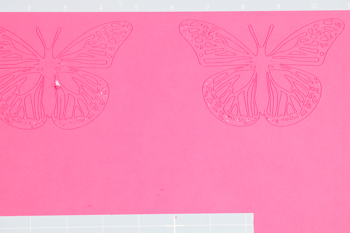 Hot pink butterflies cut with Cricut machine.