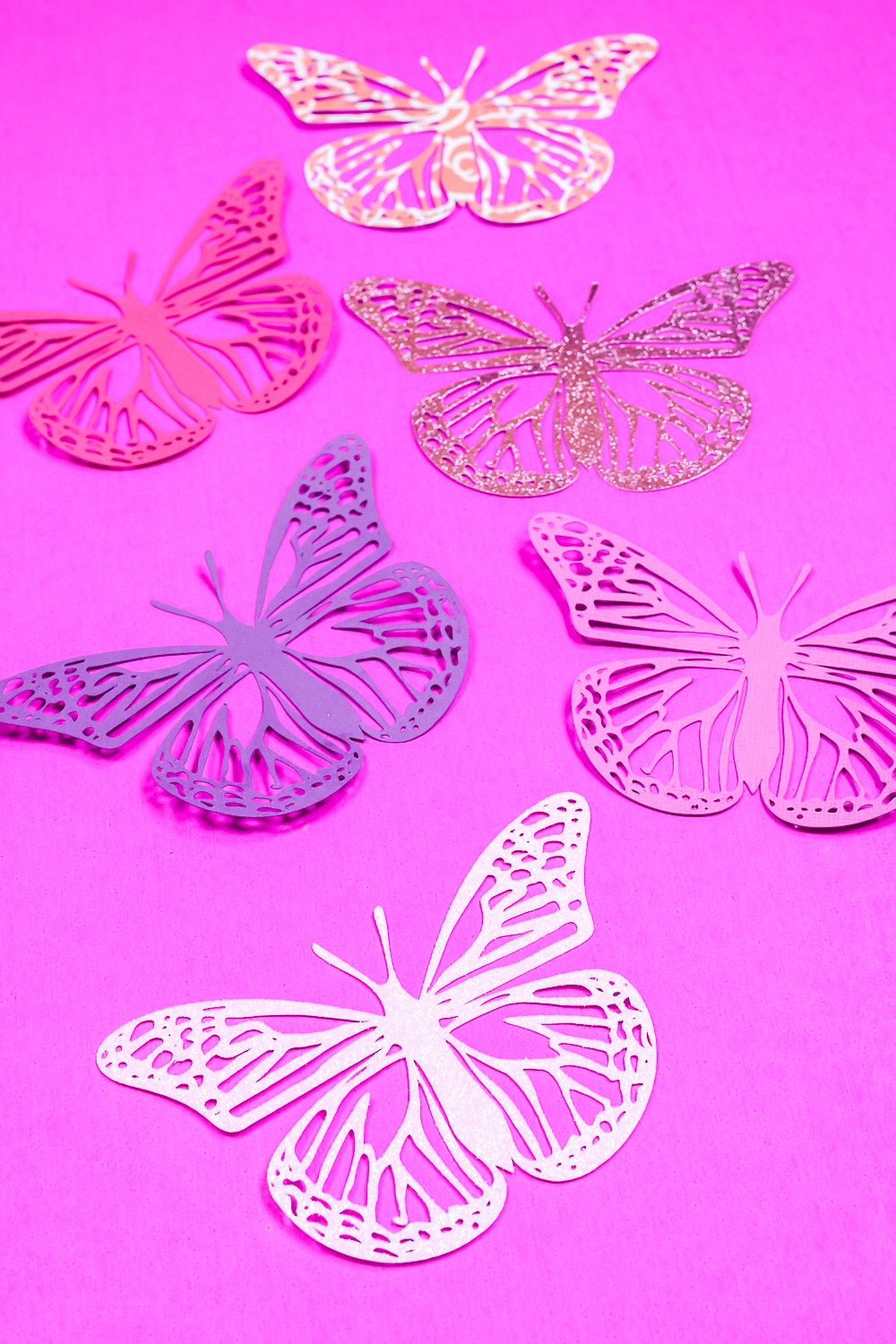 Finished intricate cut cardstock butterflies - vertical.