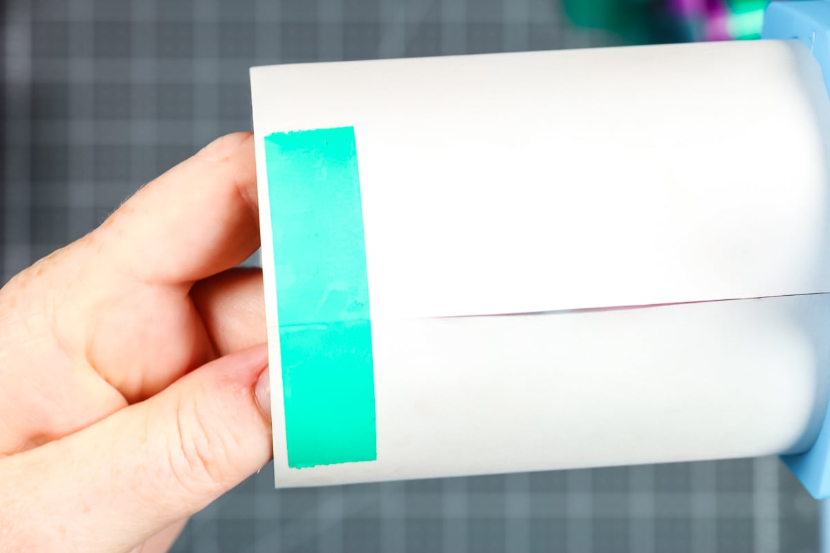 Pull print sides together with tape.