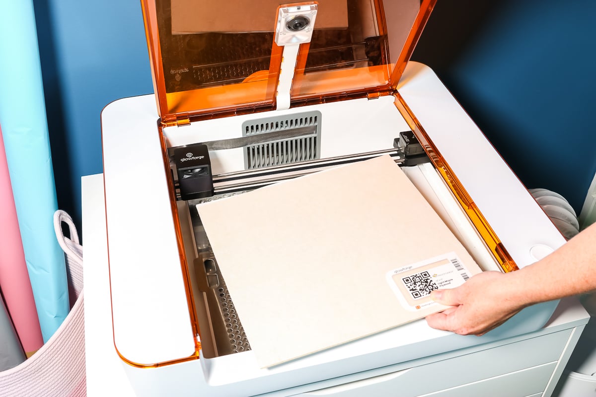 adding material to a glowforge aura machine