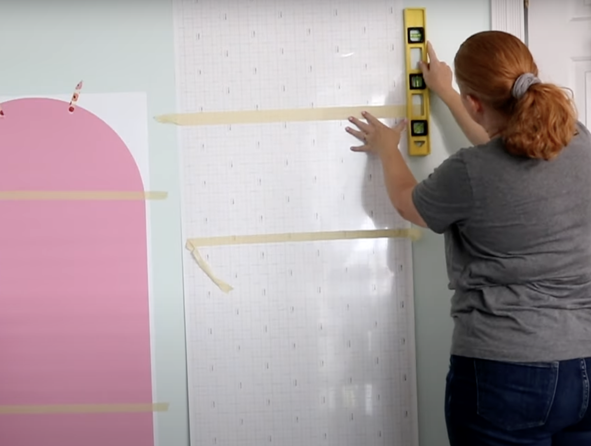 Use level to align large vinyl decals on walls.