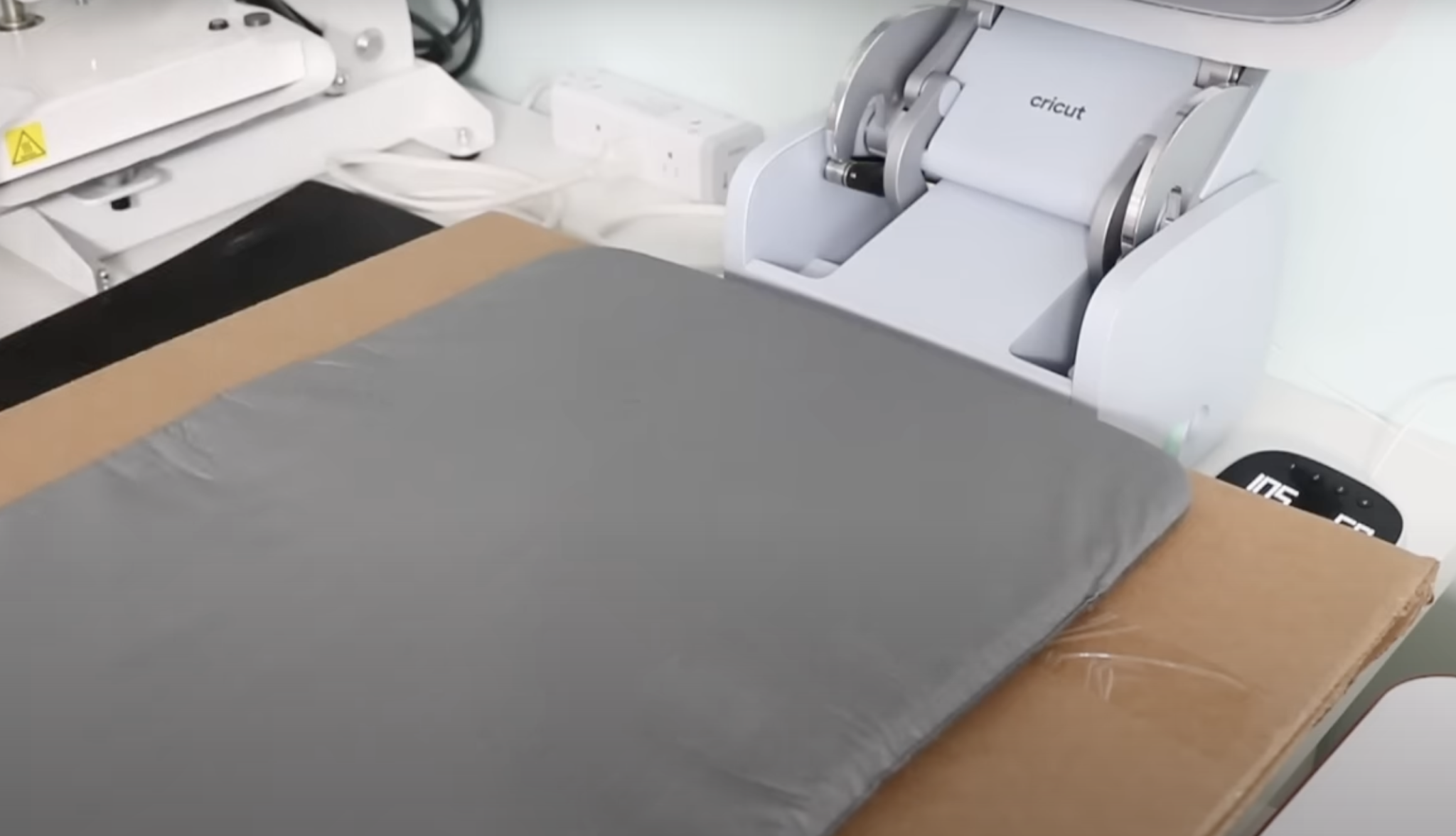 Add cardboard and EasyPress mat to heat press.