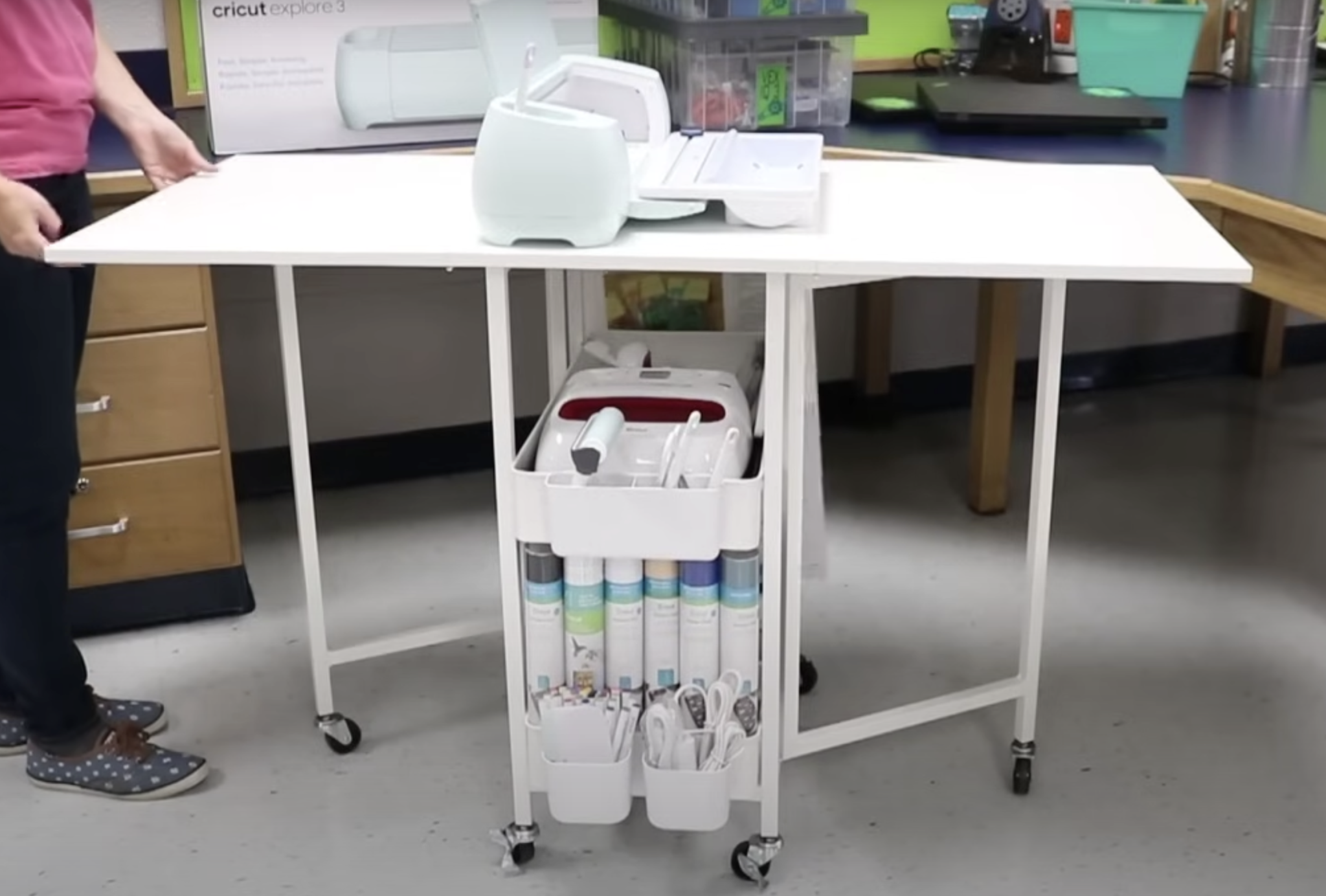 Rolling cart for Cricut with tables folded out.
