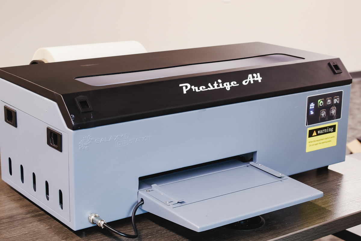 Add front tray to the Prestige DTF printer.