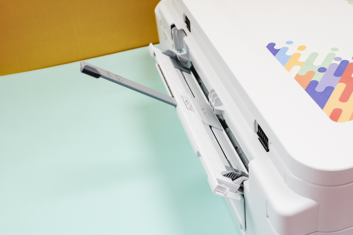 Add legal sized sublimation paper to the back of the brother sublimation printer.