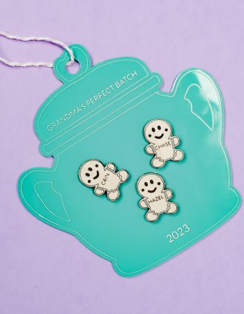 Add ribbon or twine to hang the Glowforge Christmas ornament from the tree.