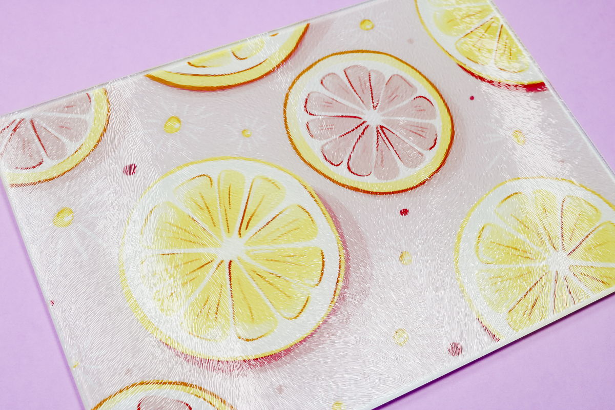 Close up of pink citrus cutting board.
