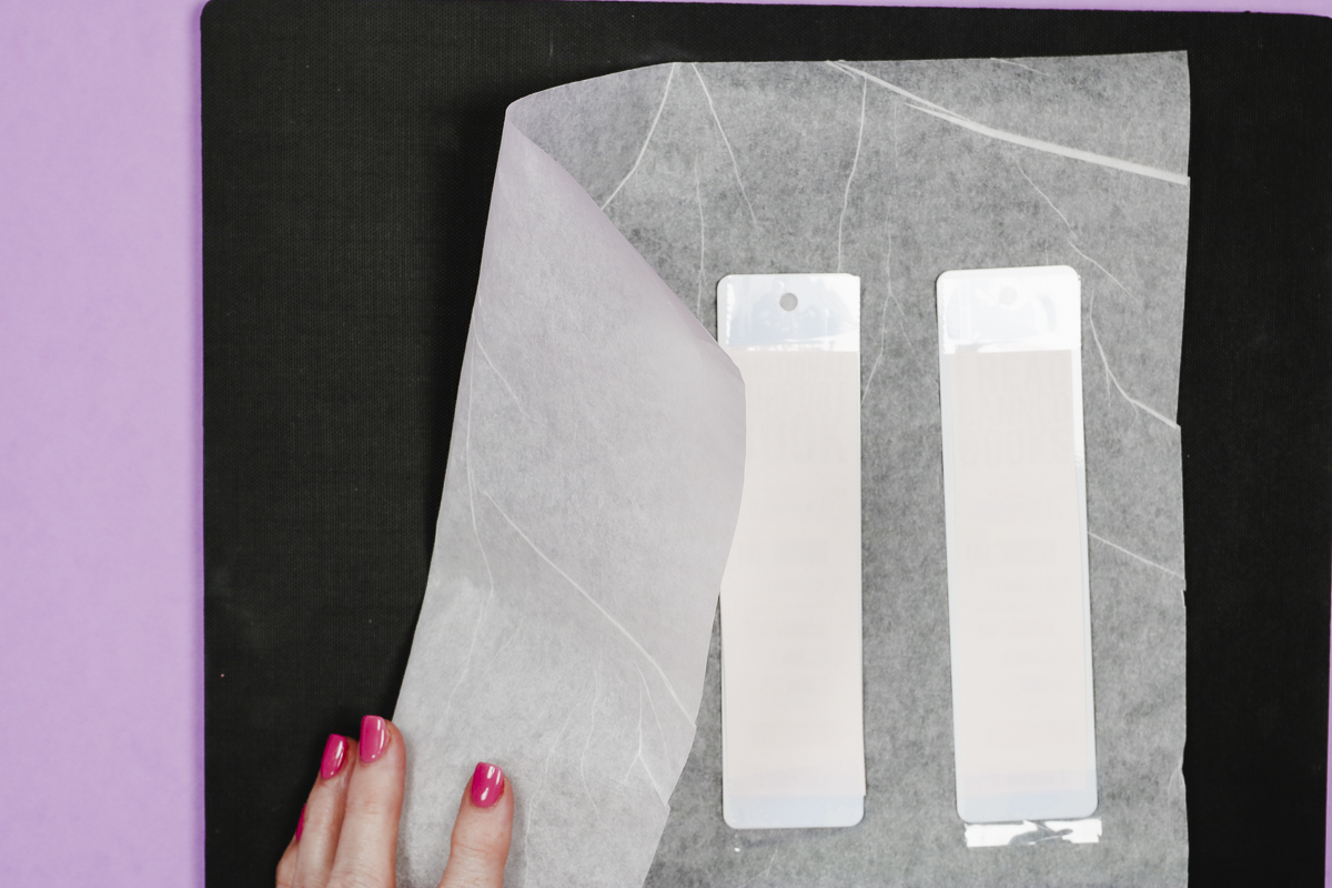 Add protective paper to cover heat-resistant mat.
