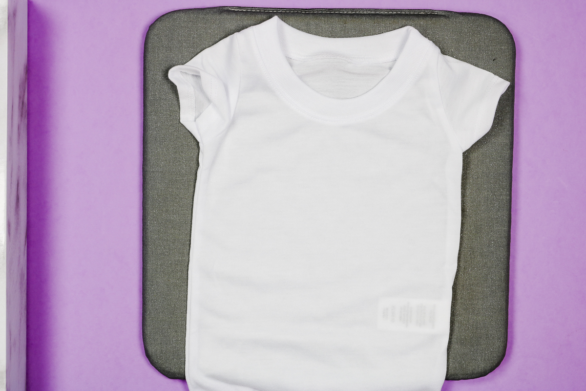 Sublimation baby onesie on EasyPress mat.