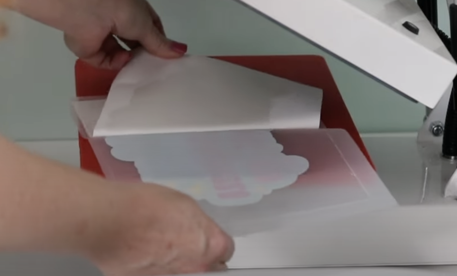 Peel back the adhesive from the print.