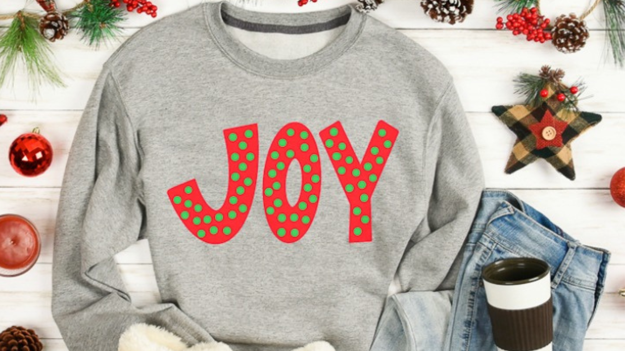 Finished free layered Joy SVG sweatshirt.