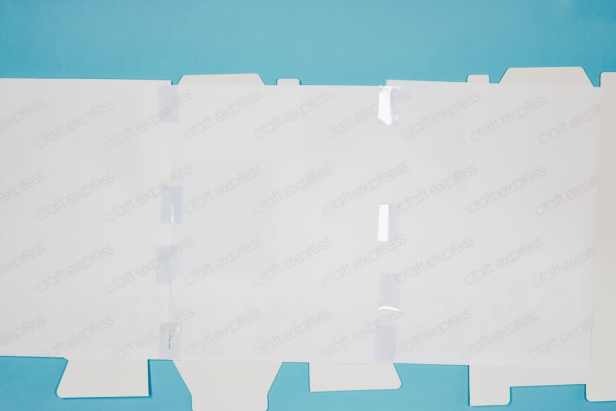 Add heat-resistant tape to the back of the sublimation print along the seams.