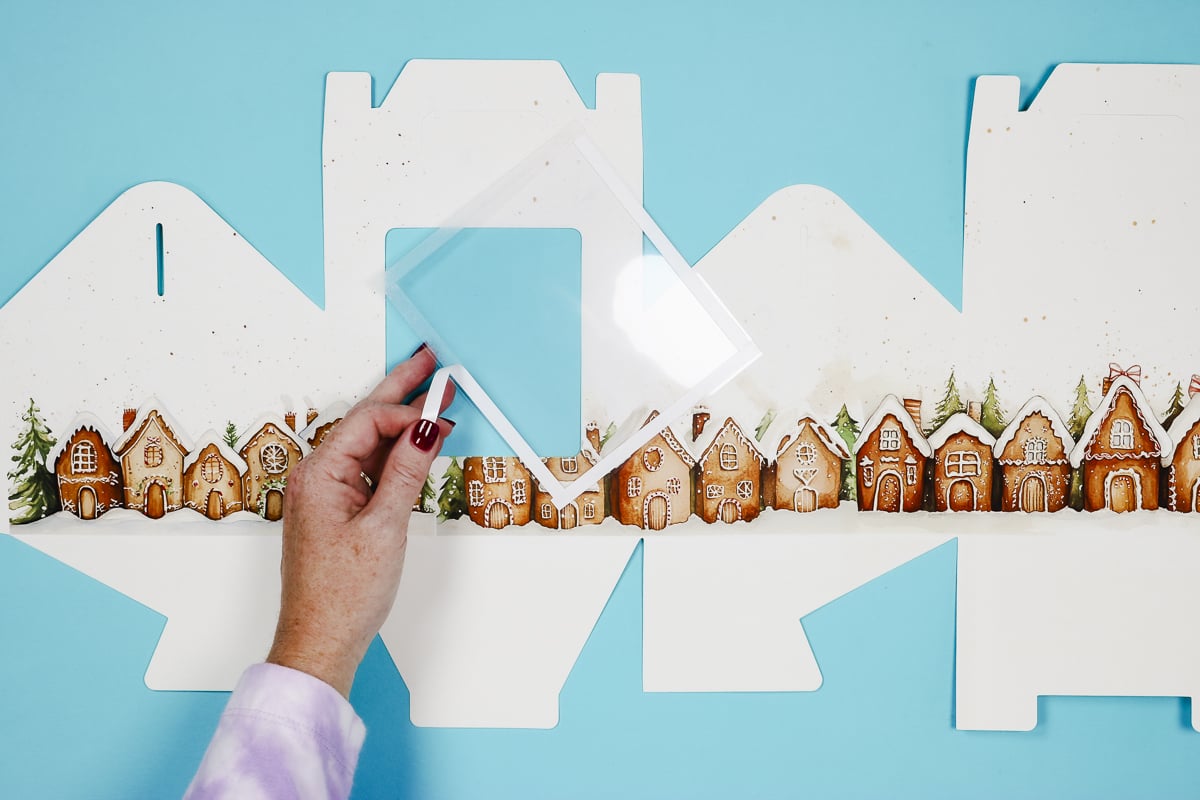 Remove tape from window film.