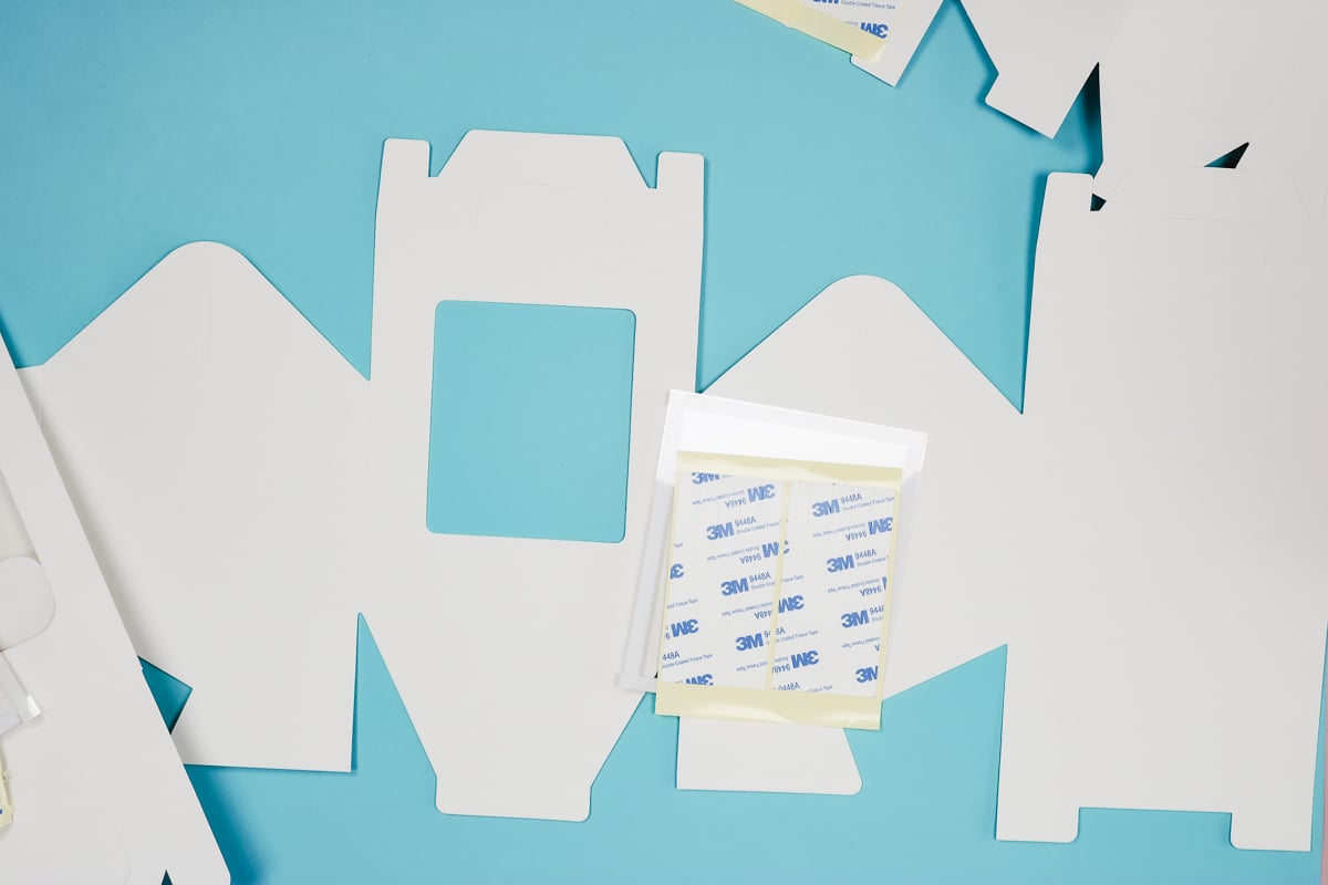 Move adhesive and plastic film to the side.