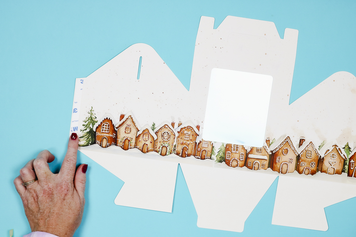 Add tape to one side of the box flap.