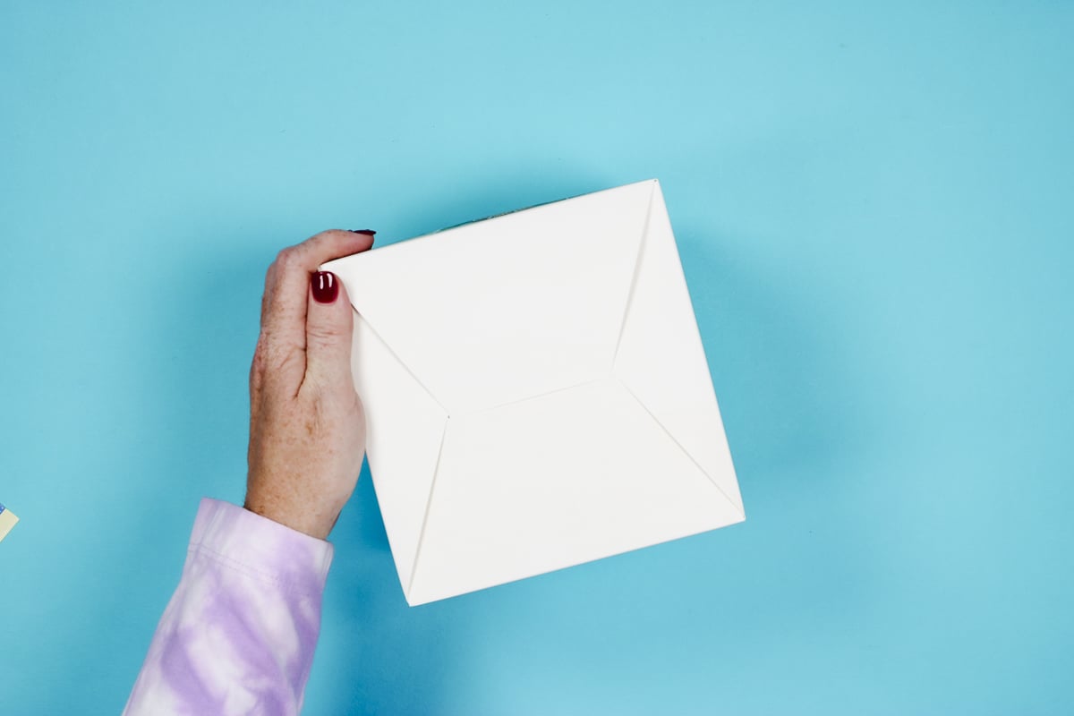 Fold bottom flaps of the sublimation gift box.