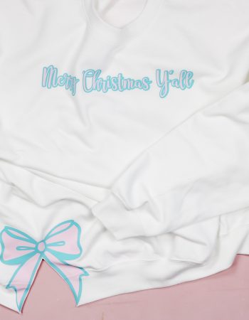 Finished sweatshirt side bow with HTV.