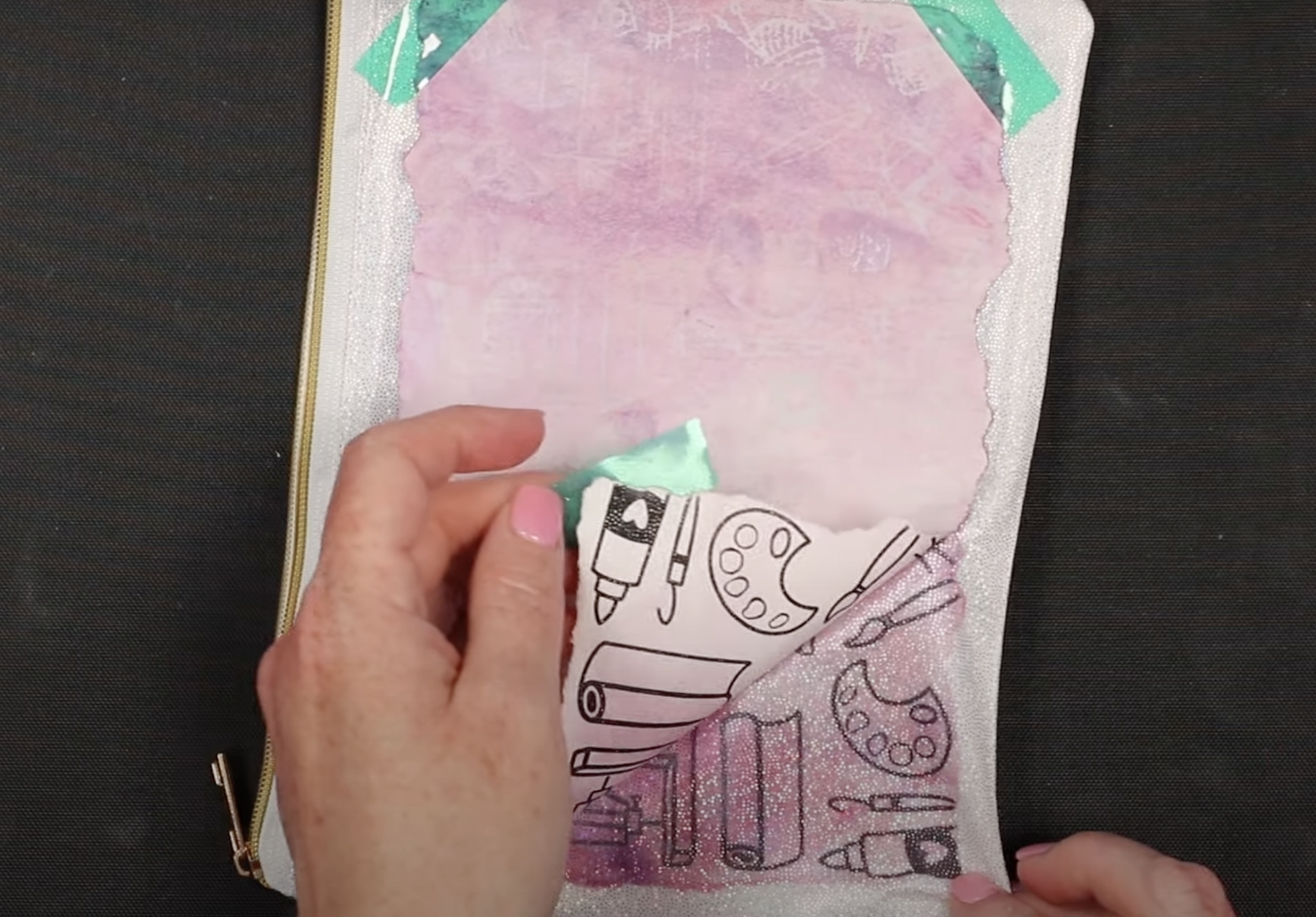 Peel sublimation print away from glitter zipper pouch.