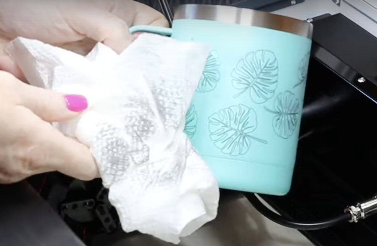 Clean tumbler to remove dust and other debris.