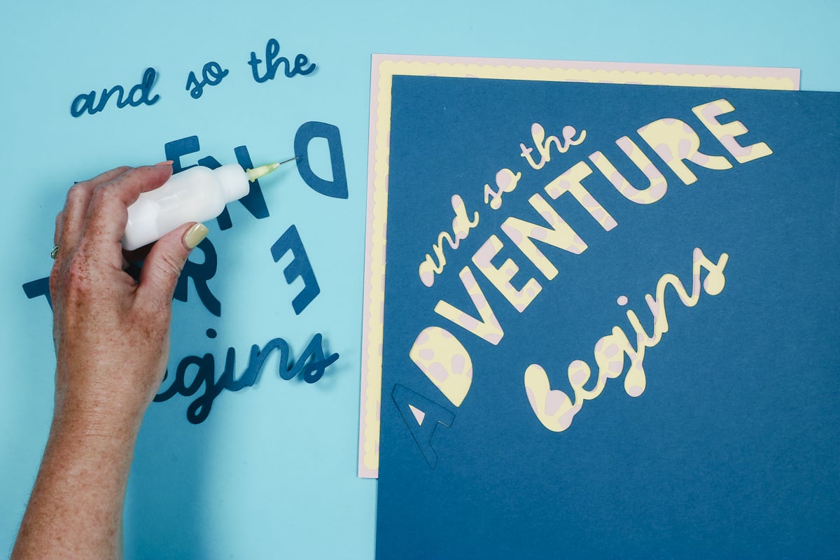 Add glue to the back of letters.