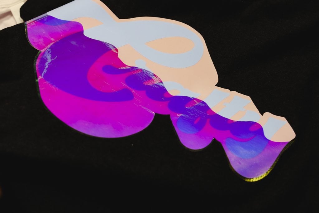 Holographic pearl HTV shirt.