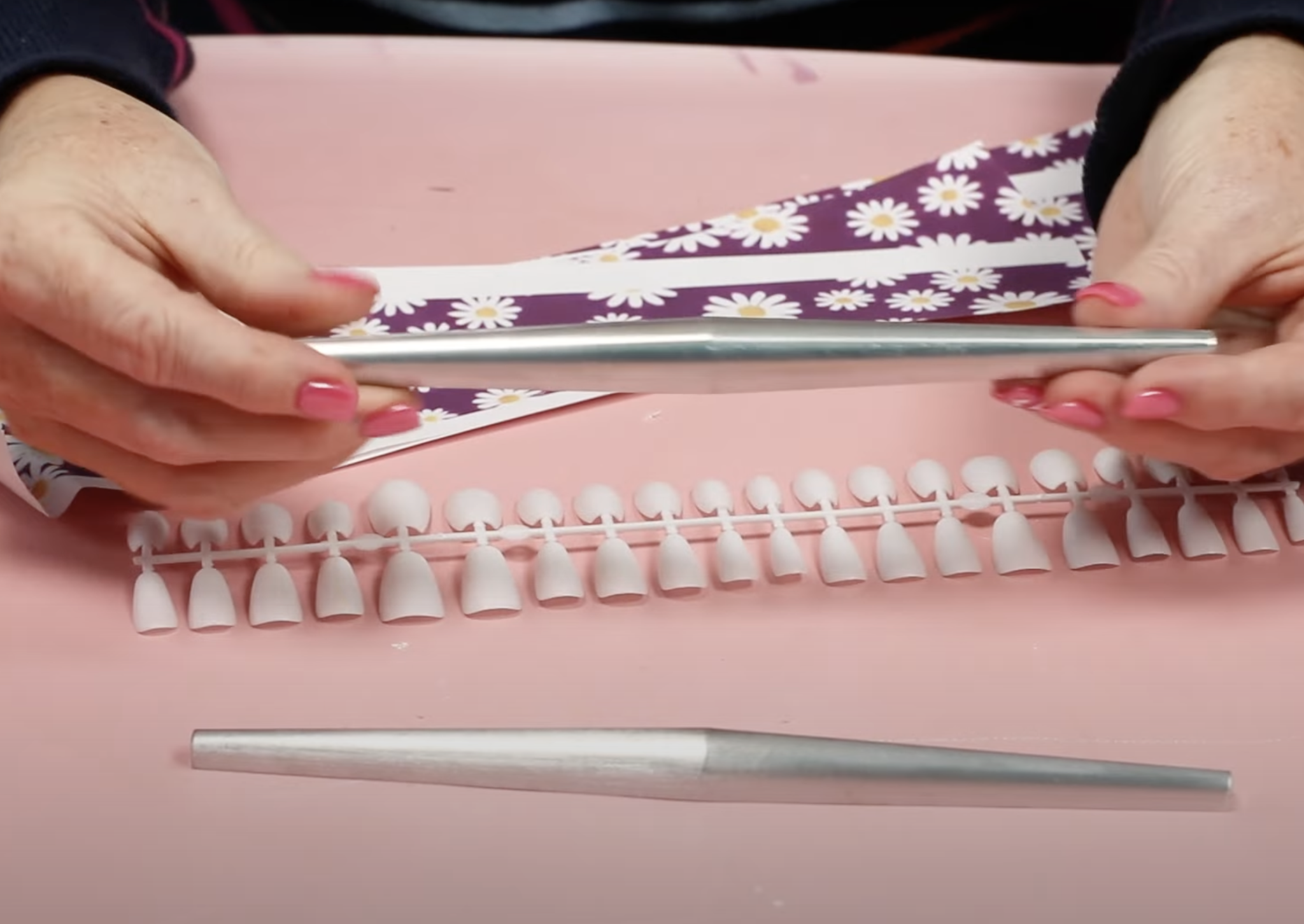Close up of sublimation nail mold.