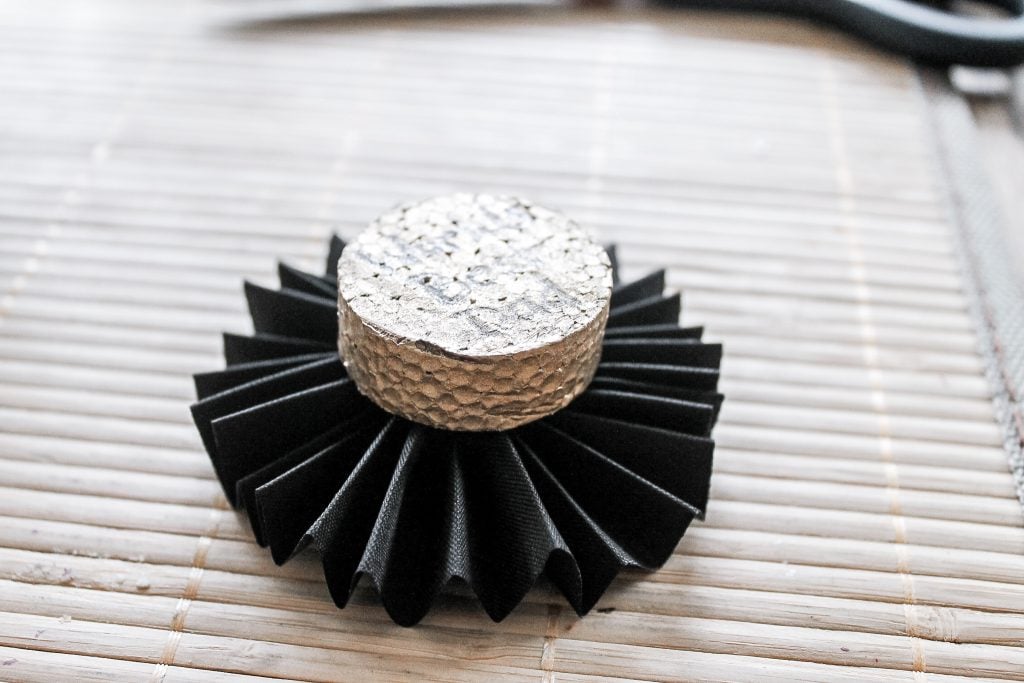 These Father's Day medals are a great craft for kids to help make for Dad. Turn the kids loose on the painting and text while you fold the ribbon and add a pin. Dad will be proud to wear these medals on his big day! Glued foam on ribbon rosette