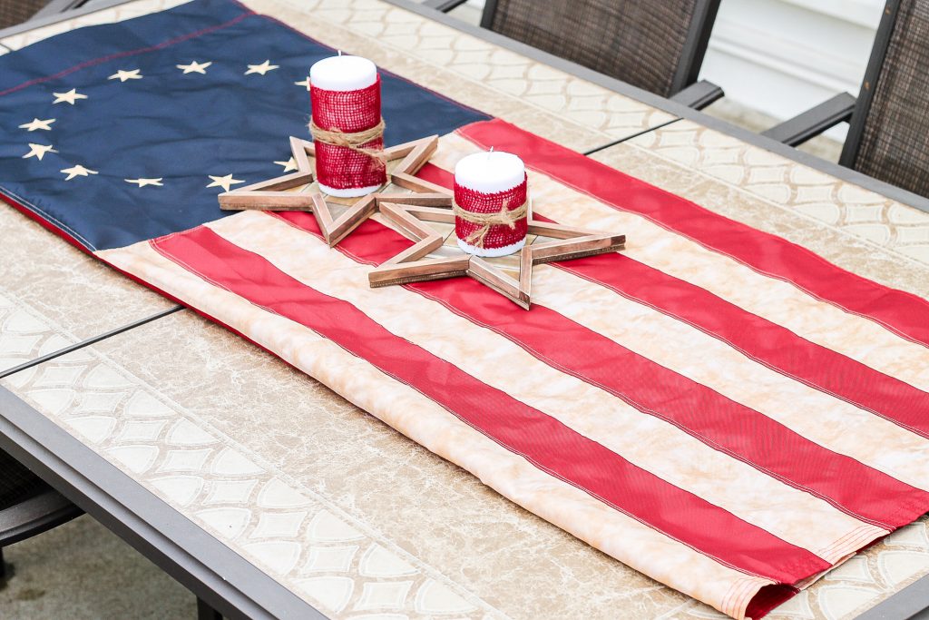 Folded tea-stained flag on table