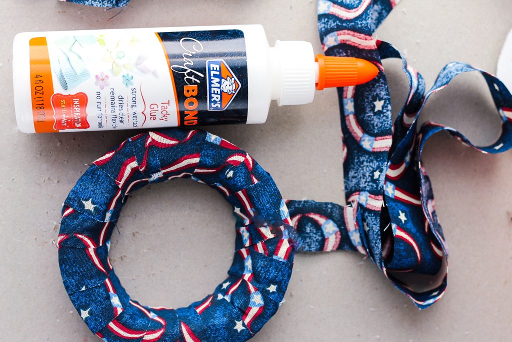Gluing cut fabric to foam