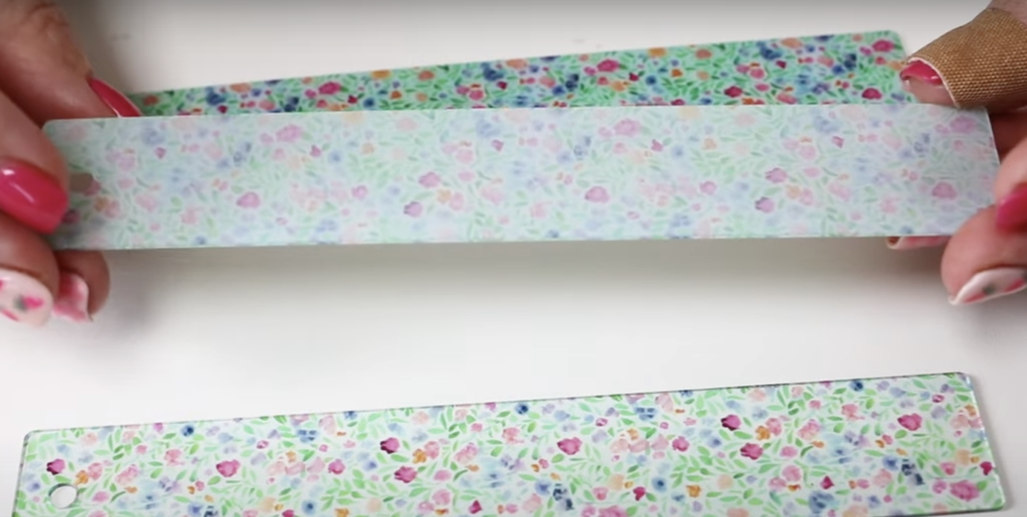 Back of acrylic bookmark with CMYK then White ink.